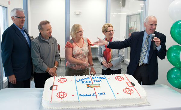 THEY KICK STARTED IT ALL: Peter and Cathy Clark donated $1 million in 2010 to help build a second ice rink at Leaside Memorial Community Gardens. On hand for the cake cutting are Don Valley West MP John Carmichael, left, and Ontario Premier Kathleen Wynne and Councillor John Parker, at right.