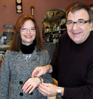 Photis Philos presents Sylvia Crossley with her Movado watch.