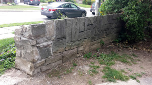 The stone wall cut back for heavy equipment