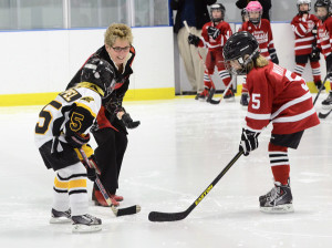 Premier Kathleen Wynne drops the first puck for the March Madness hockey tournament.
