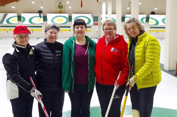 PIcture of Karli Vezina surrounded by her new curling mentors (Gail Ann Ferguson, Janet Macmillan, Paivi Liitela & Jane Burgess)