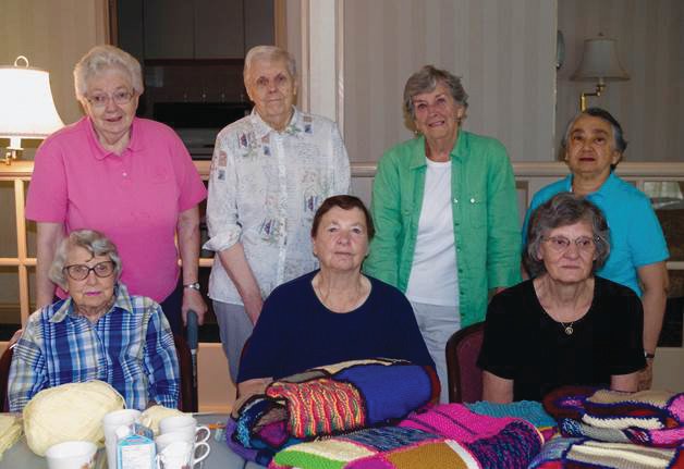 Leaside’s knitting ladies led by Doreen Sherk (back row, 2nd from the right)
