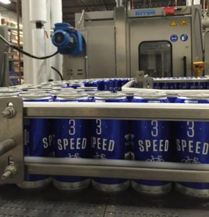 Beer being packaged in factory