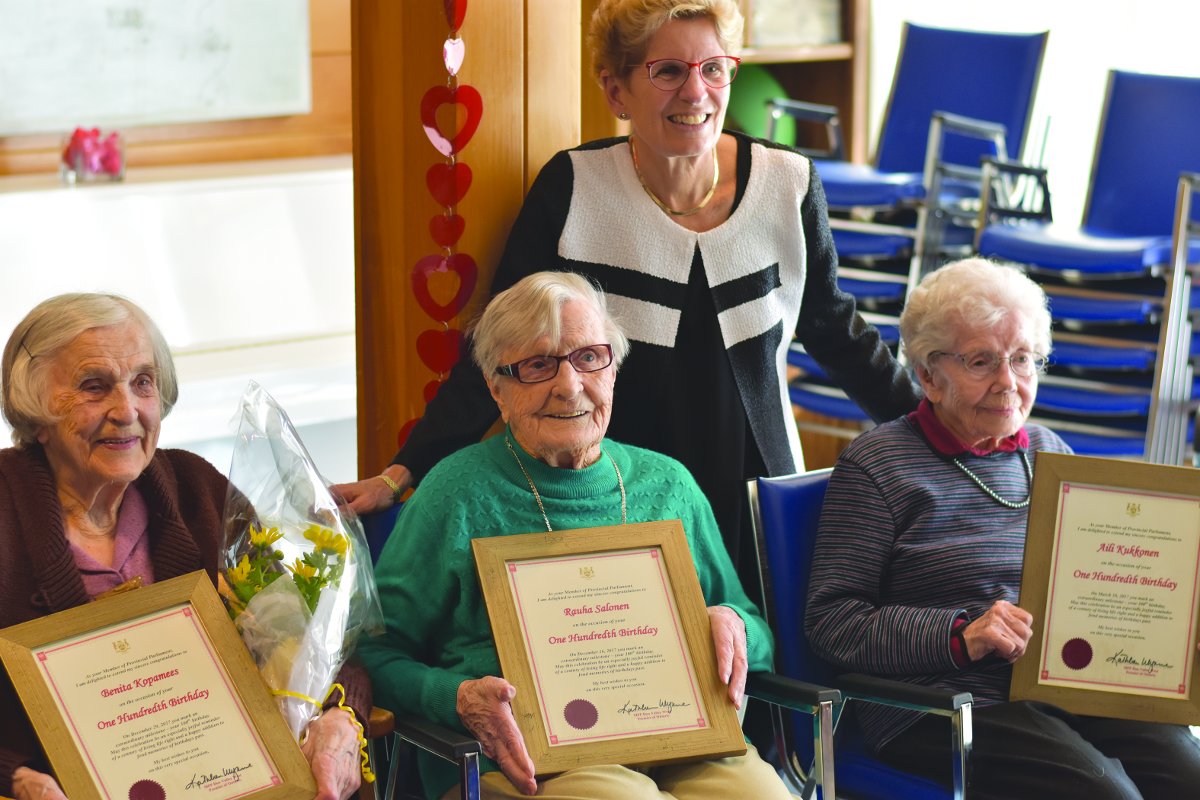 Premier Kathleen Wynne at the Suomi-Koti Seniors Centre with honourees, (l -r) Benita Kopamees, Rauha Salonen and Aili Kukkonen. 