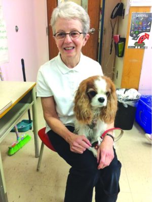 Sue Jamieson and her therapy dog Trinket visit Bessborough School