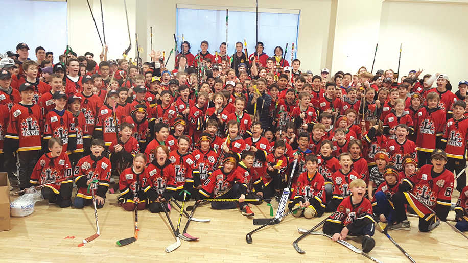 Leaside Flames teams brought sticks to their banquet and one team raised over $1,000 in aid.