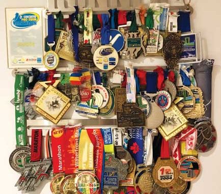 Some of the doctor’s medals from his many races.