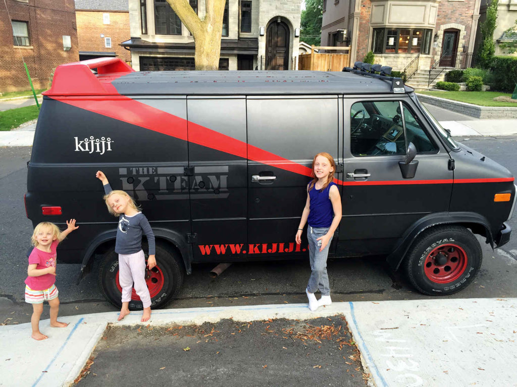 The girls in front of the Kijiji Van, a replica of the A-Team vehicle.