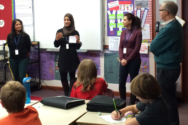 Discussing refugees at Northlea School, from left, Malini Singh, Noura Al-Khafagi, Leila Farzaneh and Bill Pashby
