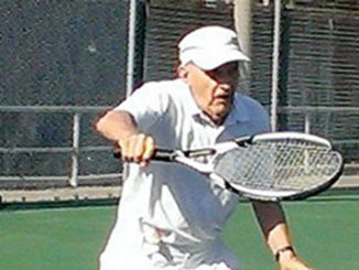 Ivar playing tennis.