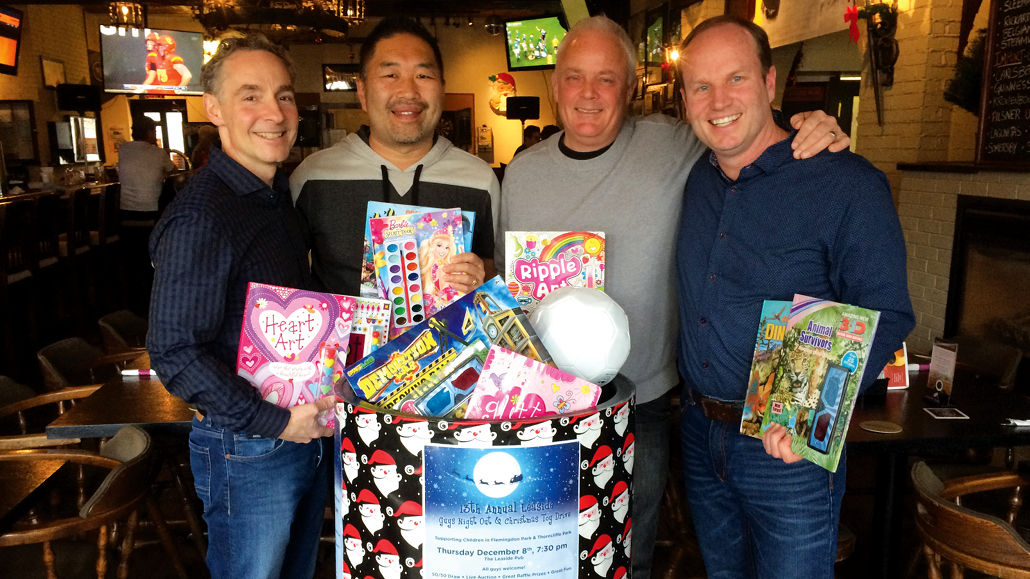 L-R: Organizers Jeff Hohner, Ed Wong, Mike Zivot and Daryn Everett with some of their loot.