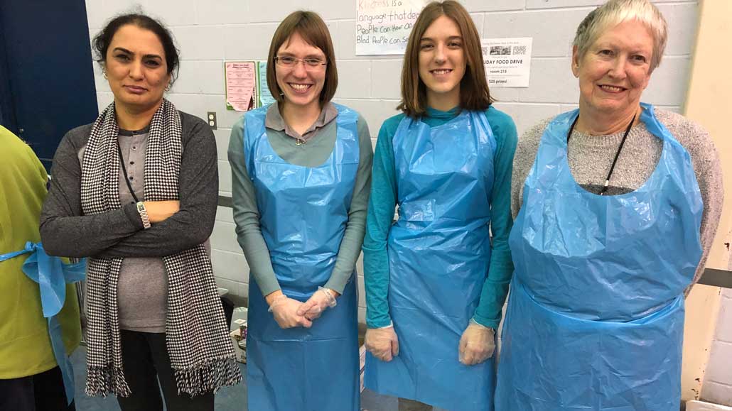 FPM’s Banazir Yousofi and volunteers, Natalie Jahn, Madison O’Brien and Margaret McRae.