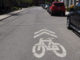 Sharrows (pictured here) indicate where cyclists should ride. For motorists, they are a reminder to share the road. Photo City of Toronto.