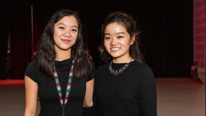 Zhen, left, with York University student volunteer Celina Cong at the Science Centre Innovators Ball.