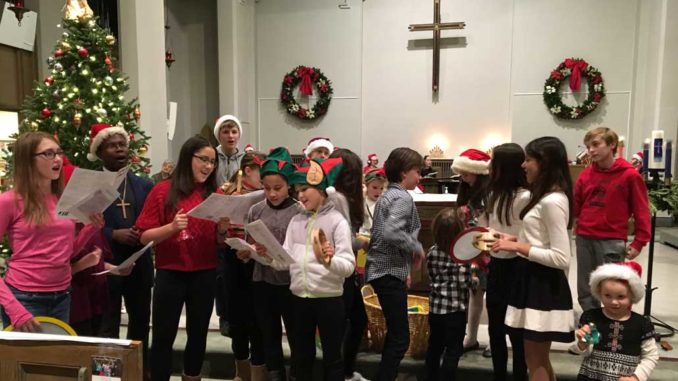 Caroling at St. Cuthbert's Anglican. Photo Kathi Davies.