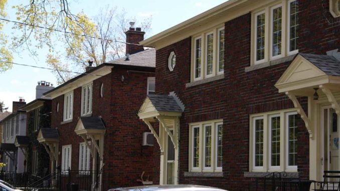 A row of traditional semi-detached homes in Leaside. Staff Photo.