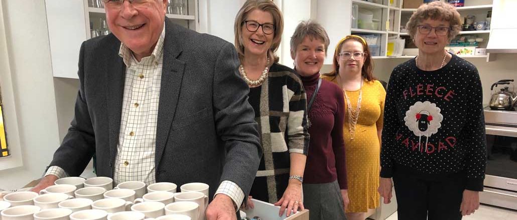 Volunteers working in the new kitchen: Dick Cowan, Anne Raby, Inga Theberge, Wendy Turley and Dorothy Cowan. Photo Janis Fertuck.