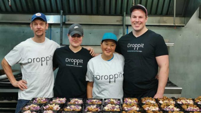 John Mangold (r) with the Droppit meal preparation team. Photo from Droppit.