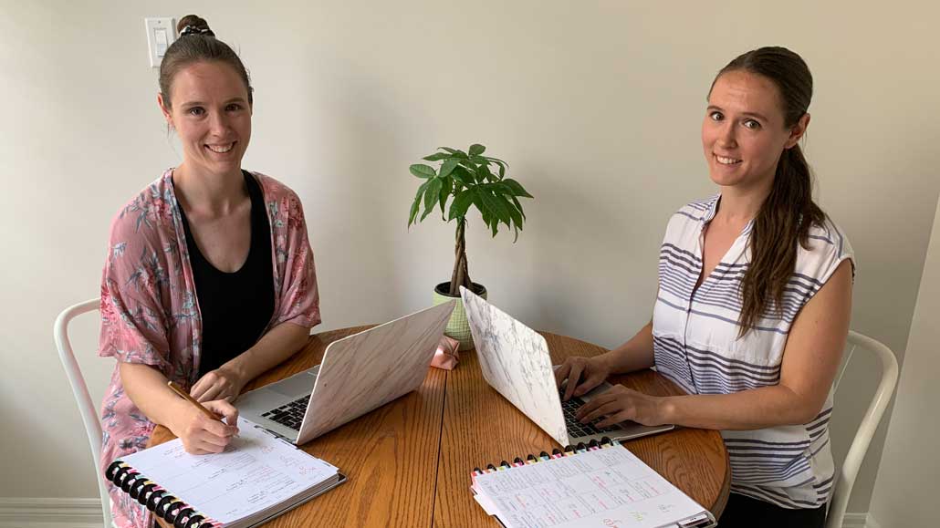 Kimberly and Laura at work. Photo by Marianne French. 