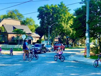Try a “bike train” like Pedalheads. A parent at each end. One parent blocks the intersections as the train rolls through. Photo by HOLLY REID.