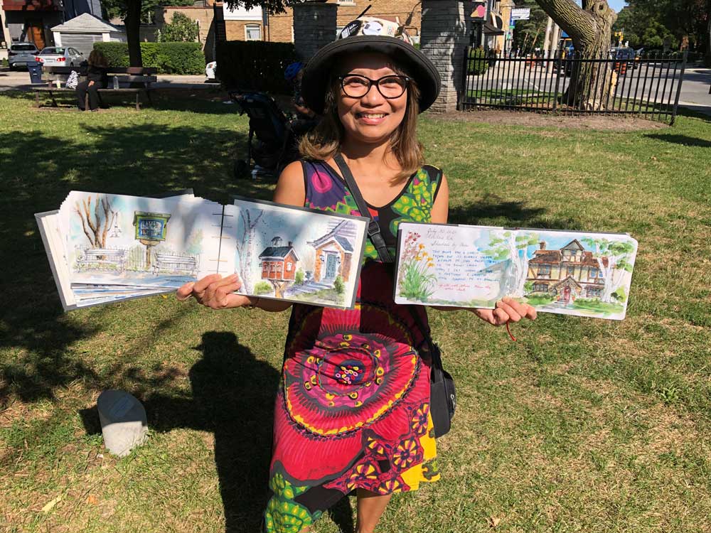 Isabel with her sketchbooks. Photo by Janis Fertuck.