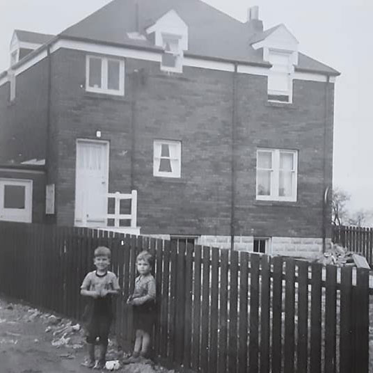 John and Ronald Turner at the rear of their new home at 29 McRae Dr., circa 1938. Collection of Susan Parr.