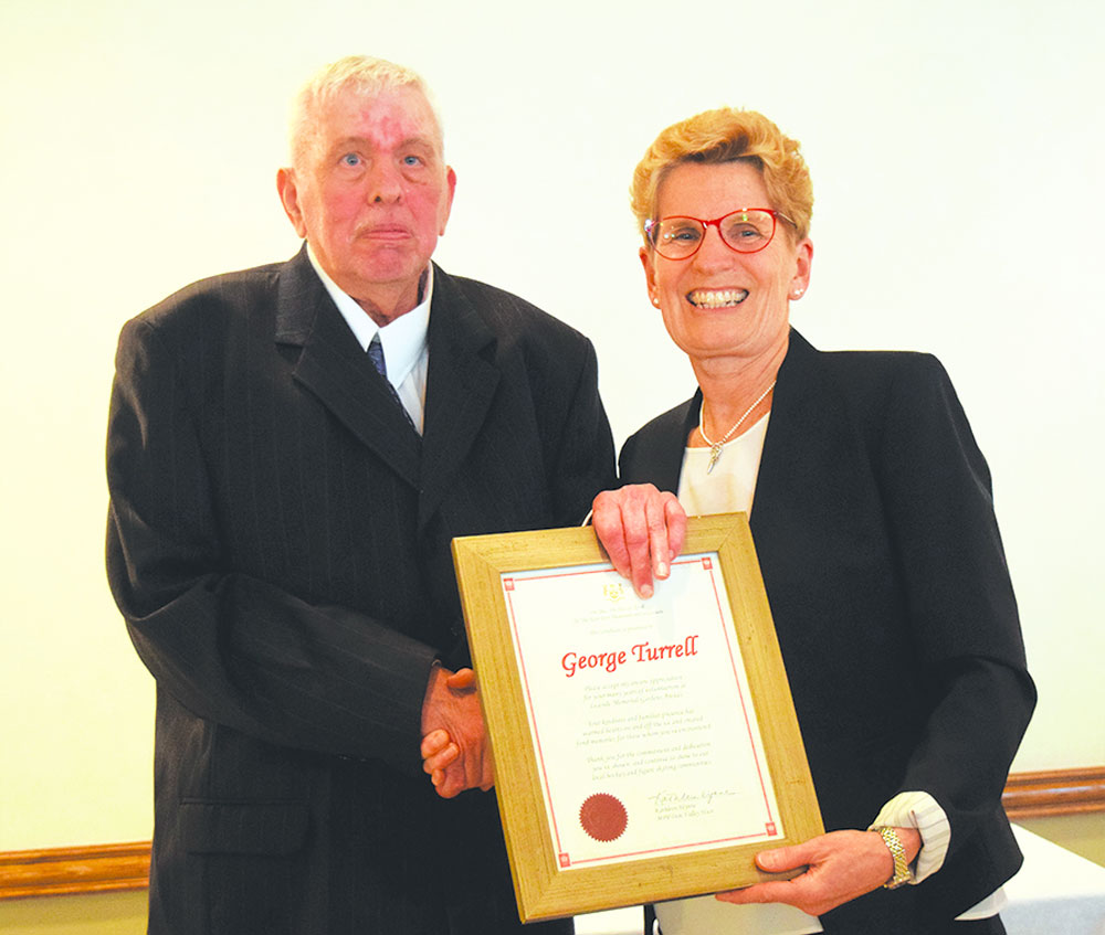  George Turrell received award from Kathleen Wynne. Photo by Dan Girard.