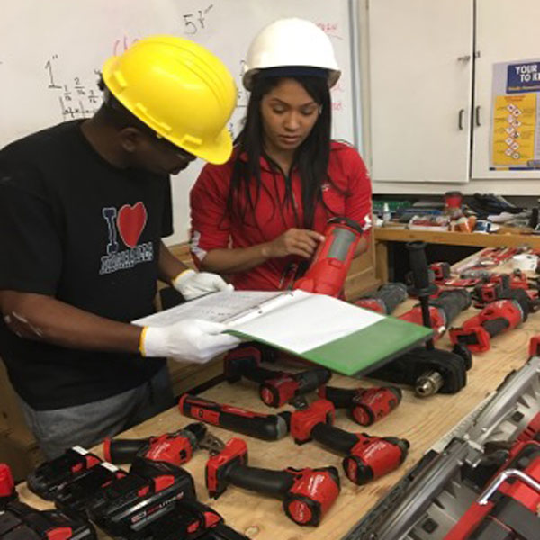 Photo of Aamir Sukhera and Shukria Dualeh, team members from The Neighbourhood Organization (TNO) Trades Connect program. Photo by Glenn Asano.