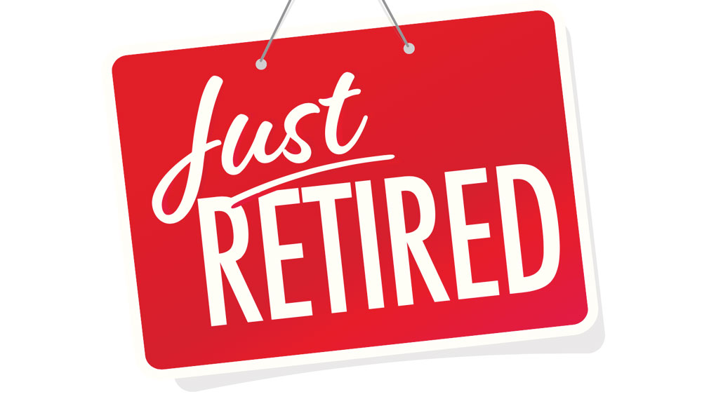 Image of a red sign with the words, "Just Retired"