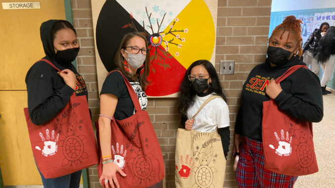 L-r: Corniesha Frederick, Tobie Loukes, Arjean Prostrero, Gabrielle Watt with their hand made totes. Photo Kayla Williams.