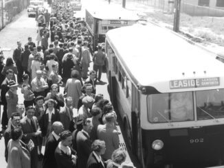 REL and other Leaside war workers board buses, 1943. Photo from TTC Archives.