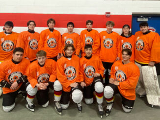 U17AA wearing orange jerseys to raise awareness for Indigenous issues. Photo from Tabatha Bull.