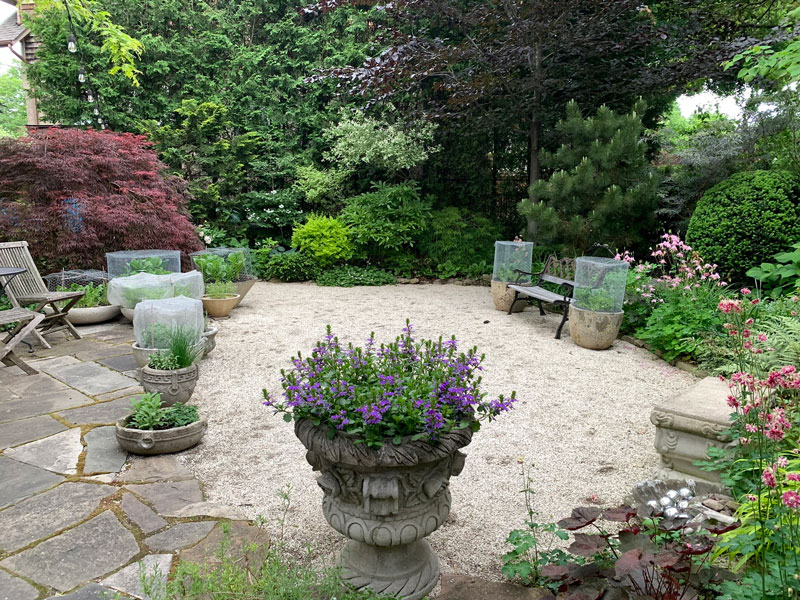 The charming herb patio – photo by Karen Keay.