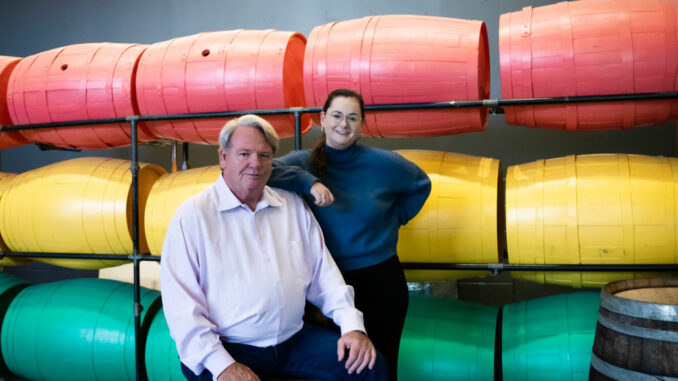 Owner Jeff Carefoote with his daughter Victoria, senior accountant, in Amsterdam’s Brew Hall on Esandar Drive.