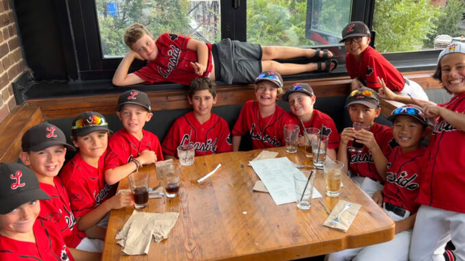 The U10 AAA team celebrates after the big win at sponsor The Local Public Eatery, Leaside. Photo Huston Loke.