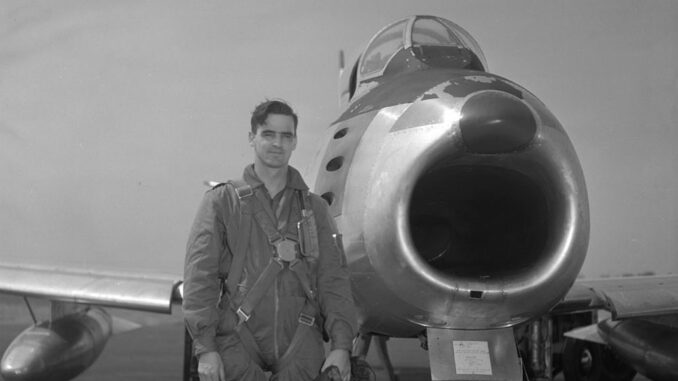 Glover beside his F-86 Sabre jet in Korea. Dept. of National Defence, Canada.