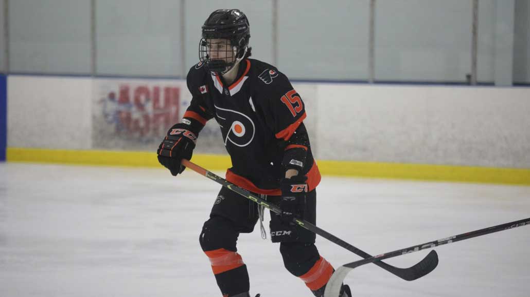 Adam Smeeton on the ice for the Don Mills Flyers.