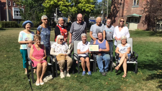 The St. Cuthbert's Gard'n Angels receiving the Leaside Garden Society Award. 