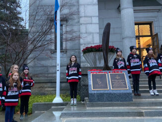 Members of the Toronto Leaside Wildcats lowering the RCAF flag at the Mount Pleasant Mausoleum Remembrance Day ceremony on Nov. 11, 2022. Photo Toronto Leaside Wildcats.