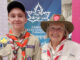 Laura Jarvis welcoming Danylo, a Ukranian Scout, now living in Canada, to the World Scout Jamboree in South Korea. Photo Susie James.